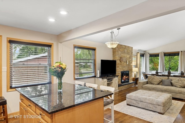 115 S We Go Trl, Mount Prospect, IL 60056 - living area featuring wood finished floors, recessed lighting, a fireplace, and vaulted ceiling