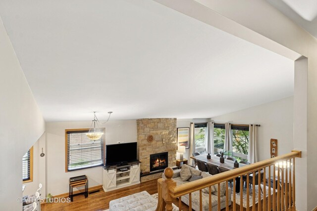 115 S We Go Trl, Mount Prospect, IL 60056 - living area featuring wood finished floors and a stone fireplace