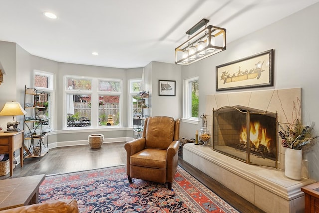 2951 Colfax St, Evanston, IL 60201 - sitting room featuring wood finished floors, a premium fireplace, baseboards, and recessed lighting