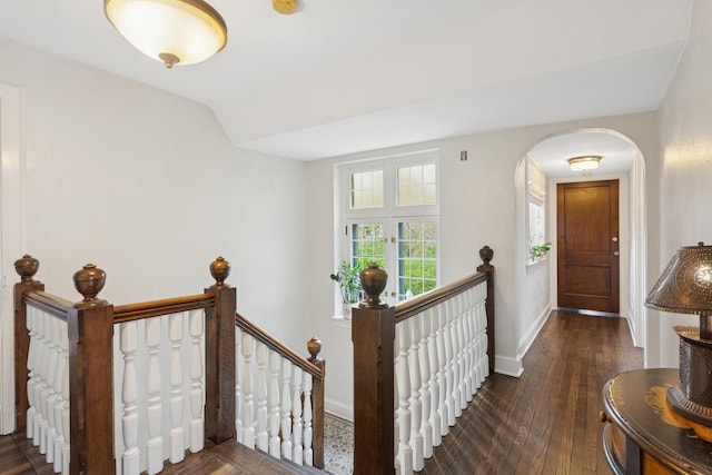 2951 Colfax St, Evanston, IL 60201 - entryway featuring dark wood-type flooring, baseboards, arched walkways, and lofted ceiling