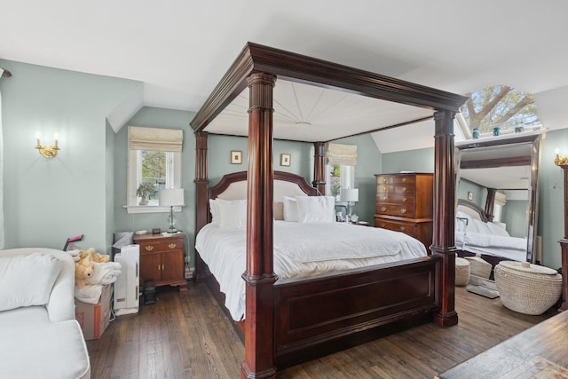 2951 Colfax St, Evanston, IL 60201 - bedroom with vaulted ceiling, dark wood-type flooring, and decorative columns