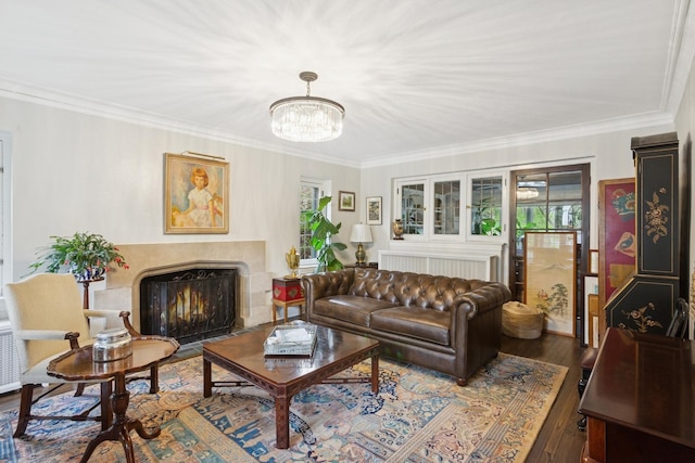 2951 Colfax St, Evanston, IL 60201 - living area with a fireplace with flush hearth, a chandelier, wood finished floors, and ornamental molding