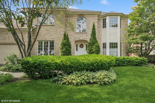 2419 Nottingham Ln, Naperville, IL 60565 - view of front of house featuring a front lawn and brick siding