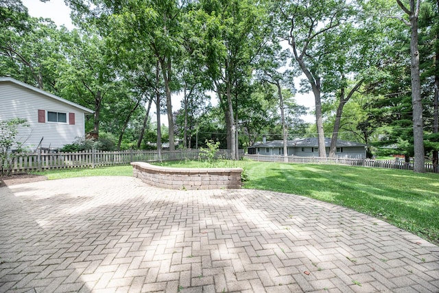 308 Dunbar Rd, Mundelein, IL 60060 - fenced backyard with a patio area and view of wooded area