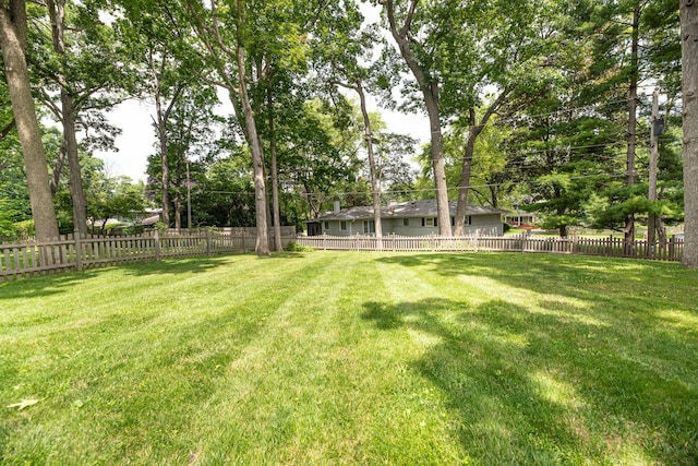 308 Dunbar Rd, Mundelein, IL 60060 - fenced backyard with view of scattered trees