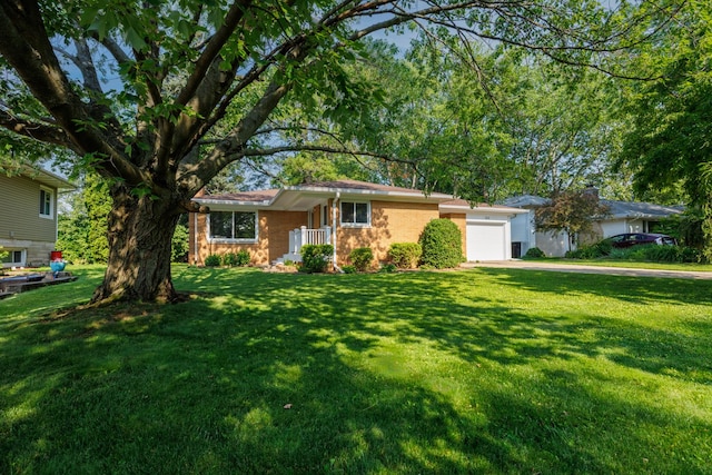 103 N Adelaide St, Normal, IL 61761 - single story home with a garage, a front yard, and concrete driveway