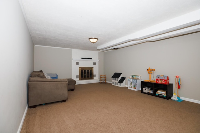 103 N Adelaide St, Normal, IL 61761 - carpeted living room featuring baseboards and a fireplace