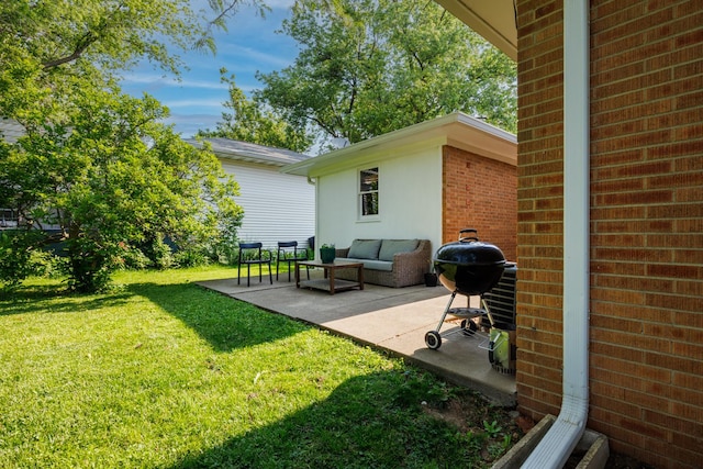 103 N Adelaide St, Normal, IL 61761 - view of green lawn with a patio area and an outdoor living space