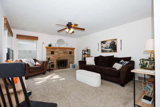 103 N Adelaide St, Normal, IL 61761 - living room with carpet flooring, ceiling fan, and a stone fireplace
