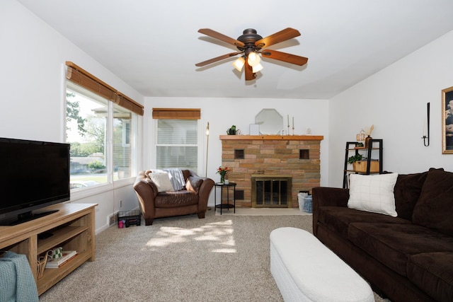 103 N Adelaide St, Normal, IL 61761 - carpeted living area featuring ceiling fan and a stone fireplace