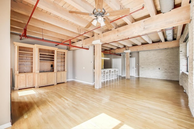 7240 Franklin St Unit 2A, Forest Park, IL 60130 - unfurnished living room featuring wood finished floors, a wood ceiling with exposed beams, and a ceiling fan