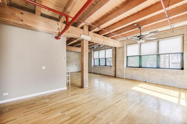 7240 Franklin St Unit 2A, Forest Park, IL 60130 - unfurnished room with wood finished floors, ceiling fan, and beamed ceiling