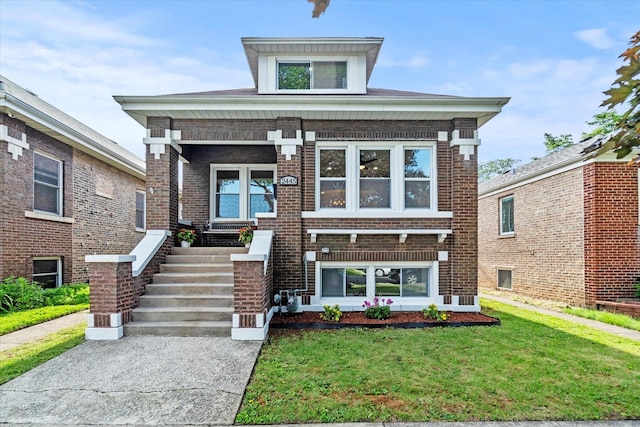 2445 Highland Ave, Berwyn, IL 60402 - view of front of house with brick siding, a porch, and a front yard