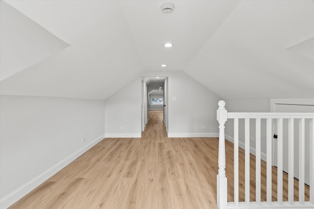 2445 Highland Ave, Berwyn, IL 60402 - additional living space featuring light wood-style flooring, lofted ceiling, and recessed lighting