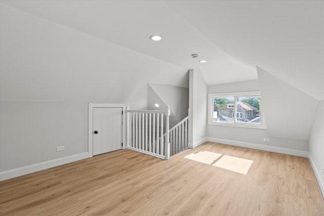 2445 Highland Ave, Berwyn, IL 60402 - bonus room with lofted ceiling, wood finished floors, and recessed lighting