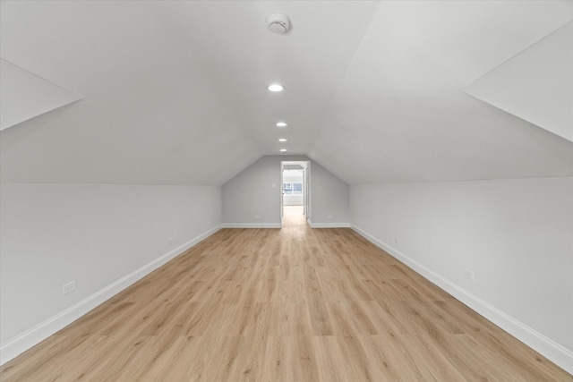 2445 Highland Ave, Berwyn, IL 60402 - bonus room with vaulted ceiling, light wood-style flooring, and recessed lighting