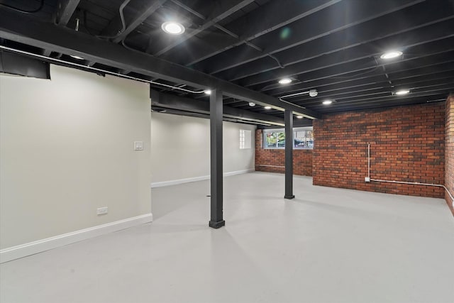 2445 Highland Ave, Berwyn, IL 60402 - below grade area featuring brick wall and baseboards