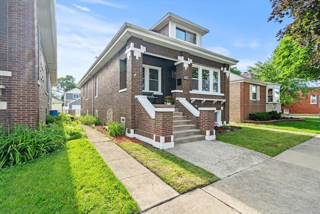 2445 Highland Ave, Berwyn, IL 60402 - view of front of house with brick siding and a front yard