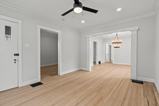 2445 Highland Ave, Berwyn, IL 60402 - unfurnished living room featuring crown molding, a ceiling fan, a chandelier, light wood-style flooring, and ornate columns
