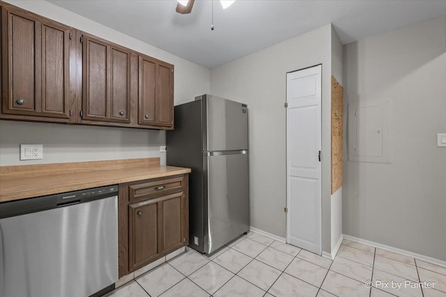 2000 Saint Regis Dr Unit 1D, Lombard, IL 60148 - kitchen featuring stainless steel appliances, light countertops, electric panel, light tile patterned floors, and dark brown cabinets