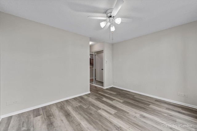 2000 Saint Regis Dr Unit 1D, Lombard, IL 60148 - unfurnished room with wood finished floors and ceiling fan