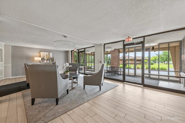 2000 Saint Regis Dr Unit 1D, Lombard, IL 60148 - community lobby featuring expansive windows and a textured ceiling