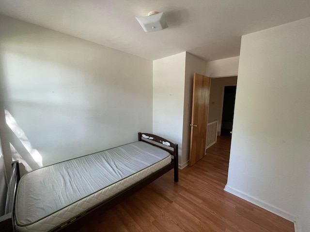 1106 Saint Andrews Cir Unit 1, Rantoul, IL 61866 - bedroom with wood finished floors and baseboards