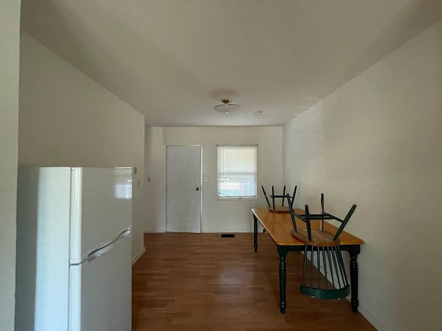 1106 Saint Andrews Cir Unit 1, Rantoul, IL 61866 - entryway featuring wood finished floors and baseboards