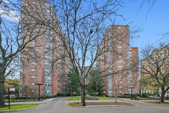 4950 N Marine Dr Unit 1105, Chicago, IL 60640 - view of asphalt road featuring curbs and street lighting