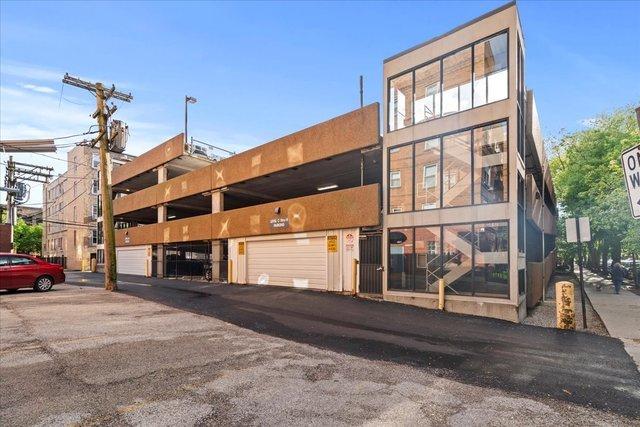 4950 N Marine Dr Unit 1105, Chicago, IL 60640 - view of property featuring uncovered parking