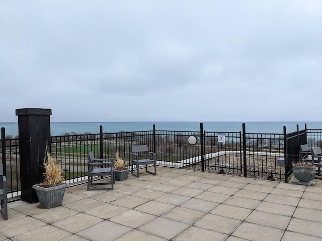 4950 N Marine Dr Unit 1105, Chicago, IL 60640 - view of patio with a water view