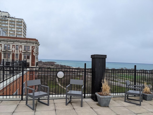 4950 N Marine Dr Unit 1105, Chicago, IL 60640 - view of patio featuring a water view