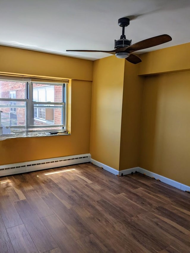 4950 N Marine Dr Unit 1105, Chicago, IL 60640 - empty room featuring ceiling fan, a baseboard heating unit, and wood finished floors