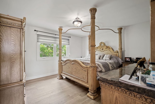 1542 Woodcreek Trl, Bartlett, IL 60103 - bedroom featuring light wood-style flooring and baseboards