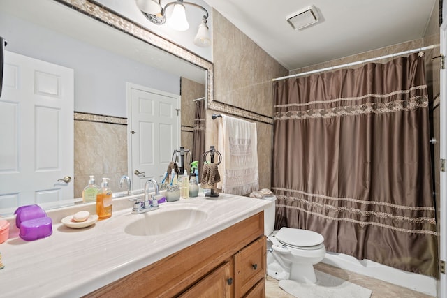 1542 Woodcreek Trl, Bartlett, IL 60103 - full bath with vanity, tile walls, and tile patterned flooring
