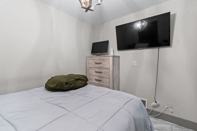 21203 S 93rd Ave, Frankfort, IL 60423 - bedroom with marble finish flooring and a chandelier