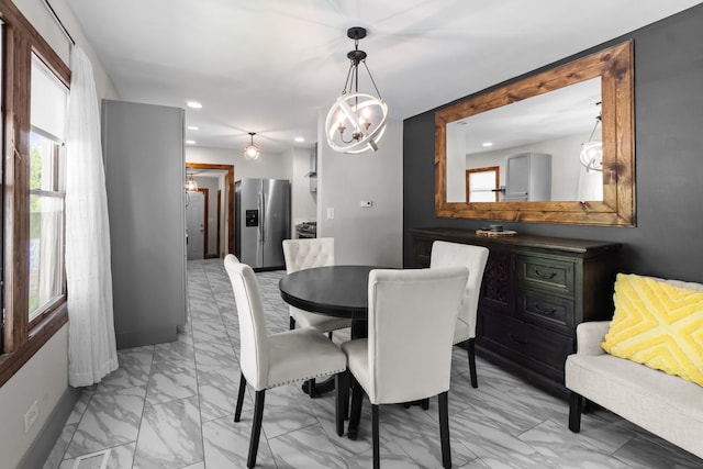 21203 S 93rd Ave, Frankfort, IL 60423 - dining area featuring light marble finish flooring, recessed lighting, a chandelier, and healthy amount of natural light