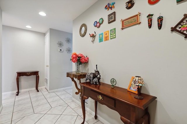 1105 N Mill St Unit 215, Naperville, IL 60563 - hallway with recessed lighting and light tile patterned floors