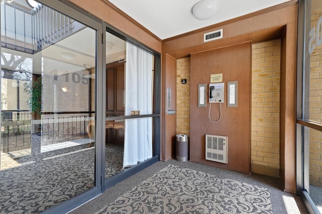 1105 N Mill St Unit 215, Naperville, IL 60563 - unfurnished sunroom featuring heating unit