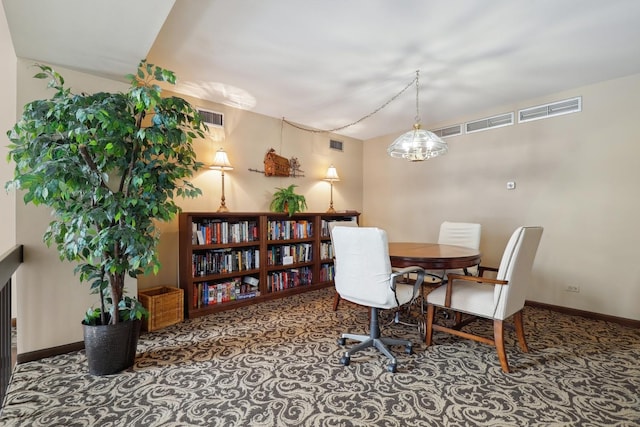 1105 N Mill St Unit 215, Naperville, IL 60563 - dining area featuring carpet floors and baseboards