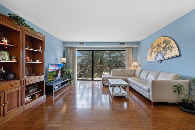 1105 N Mill St Unit 215, Naperville, IL 60563 - living room with dark wood-style floors
