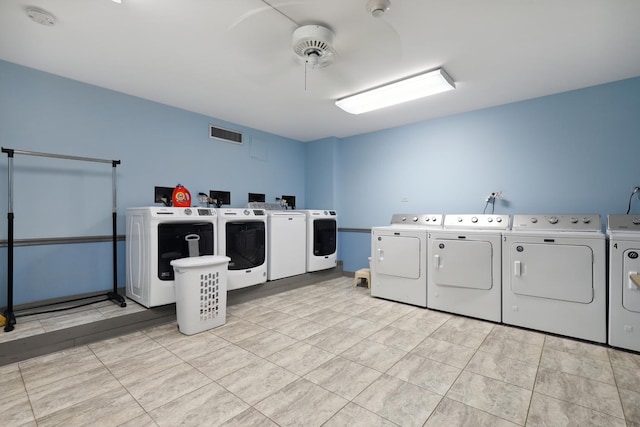 1105 N Mill St Unit 215, Naperville, IL 60563 - shared laundry room with separate washer and dryer and a ceiling fan