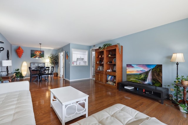 1105 N Mill St Unit 215, Naperville, IL 60563 - living room featuring wood finished floors and baseboards