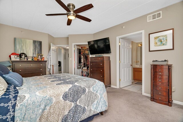 6743 S Pointe Dr Unit 1C, Tinley Park, IL 60477 - carpeted bedroom with a walk in closet, a closet, ensuite bath, and ceiling fan