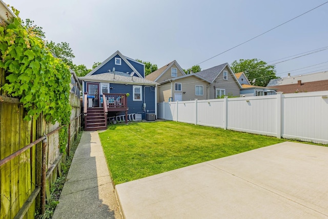 4051 S Rockwell St, Chicago, IL 60632 - rear view of house featuring a patio area, a fenced backyard, a deck, and stairs