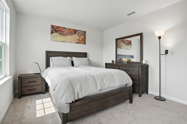 2632 Pecos Cir, Montgomery, IL 60538 - bedroom featuring light colored carpet and baseboards