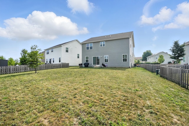 2632 Pecos Cir, Montgomery, IL 60538 - back of house featuring a fenced backyard