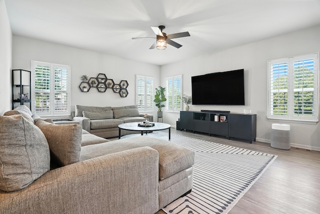 2632 Pecos Cir, Montgomery, IL 60538 - living room featuring healthy amount of natural light, wood finished floors, and ceiling fan