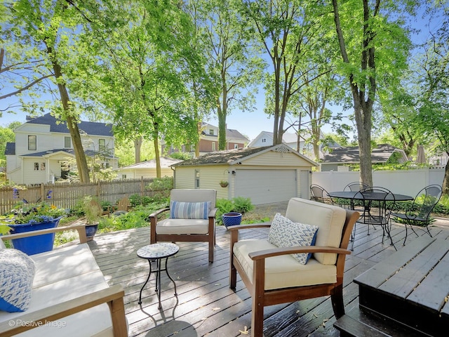 23 Blaine St, Hinsdale, IL 60521 - wooden terrace featuring outdoor dining space, an outdoor structure, a detached garage, and a residential view