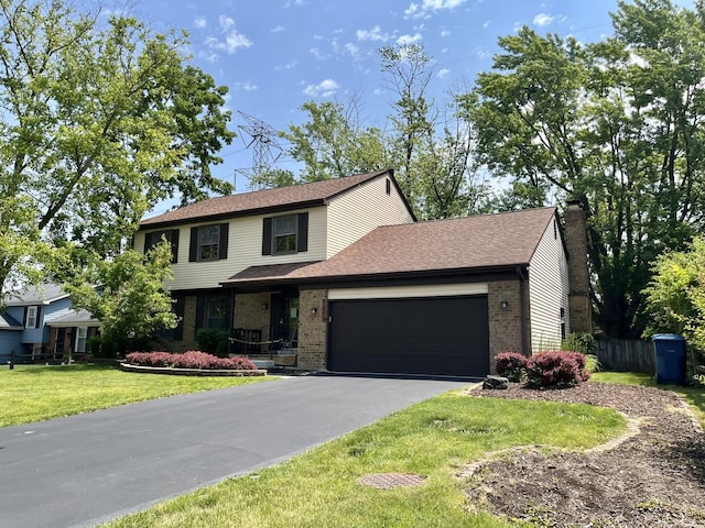3485 Ronald Rd, Crete, IL 60417 - view of front of home with brick siding, an attached garage, driveway, a chimney, and a shingled roof